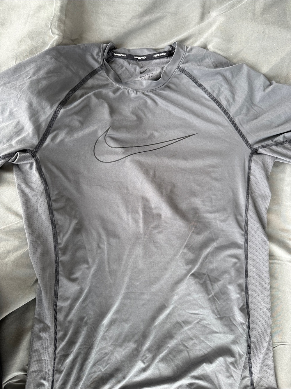 Nike Men’s Light Gray Swim Rash Guard with Subtle Swoosh